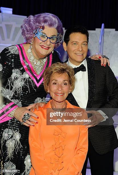 Actor Dame Edna, media personality Judge Judy Sheindlin and actor Michael Feinstein onstage following curtain call on the opening night of "All About...