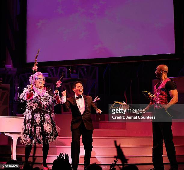 Actors Dame Edna, Michael Feinstein and Gregory Butler onstage during curtain call on the opening night of "All About Me" on Broadway at Henry...