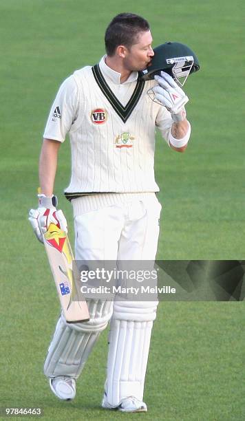 Michael Clarke of Australia celebrates scoring a century during day one of the First Test match between New Zealand and Australia at Westpac Stadium...