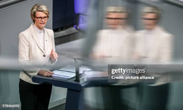 April 2018, Germany, Berlin: Anja Karliczek speaks during a meeting in the plenary hall of the Bundestag parliament. The parliament debates over...