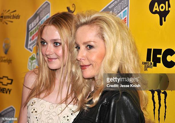 Dakota Fanning and Cherie Curry arrive at the movie premiere of "The Runaways" during the 2010 SXSW Festival on March 18, 2010 in Austin, Texas.
