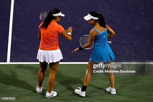 Yung-Jan Chan of Taipei and Jie Zheng of China play Kveta Peschke of the Czech Repuiblic and Katrina Srebotnik of Slovakia during the BNP Paribas...