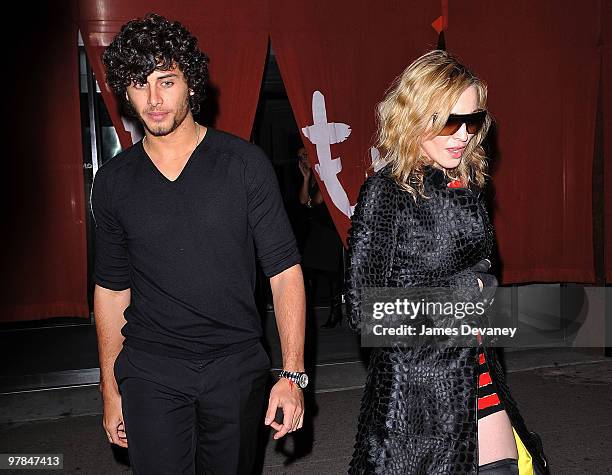 Jesus Luz and Madonna are seen leaving Morimoto in the Meatpacking District on March 18, 2010 in New York City.