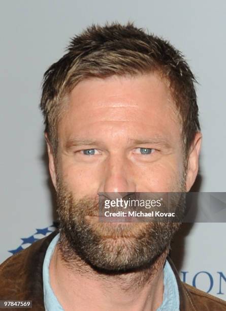 Actor Aaron Eckhart arrives at the Ferrari 458 Italia Brings Funds for Haiti Relief event at Fleur de Lys on March 18, 2010 in Los Angeles,...