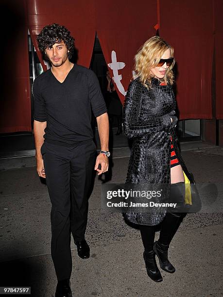 Jesus Luz and Madonna are seen leaving Morimoto in the Meatpacking District on March 18, 2010 in New York City.