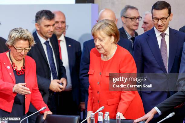 German Minister of the Environment Svenja Schulze, German Chancellor Angela Merkel and Polish Prime Minister Mateusz Morawiecki arrive for the...