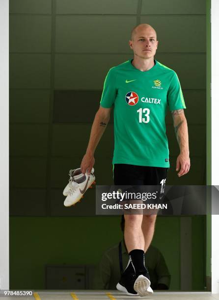 Australia's midfielder Aaron Mooy arrive for a press conference after a training session in Kazan on June 19 during the Russia World Cup 2018...