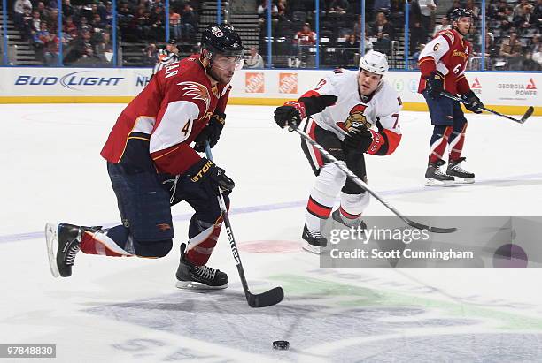 Zach Bogosian of the Atlanta Thrashers carries the puck against the Ottawa Senators at Philips Arena on March 18, 2010 in Atlanta, Georgia.