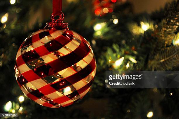 red and white christmas ornament - reston stock pictures, royalty-free photos & images