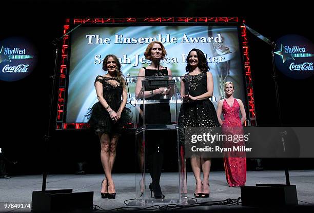 Actresses Sarah Jessica Parker Cynthia Nixon and Kristin Davis, accept the Ensemble Award at the ShoWest awards ceremony at the Paris Las Vegas...