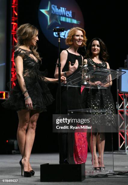 Actresses Sarah Jessica Parker Cynthia Nixon and Kristin Davis, accept the Ensemble Award at the ShoWest awards ceremony at the Paris Las Vegas...