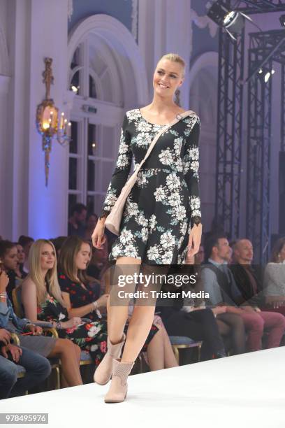 Miriam Hoeller walks the runway during the Ernsting's Family Fashion event on June 18, 2018 in Hamburg, Germany.