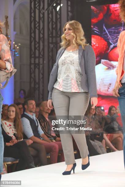Angelina Kirsch walks the runway during the Ernsting's Family Fashion event on June 18, 2018 in Hamburg, Germany.
