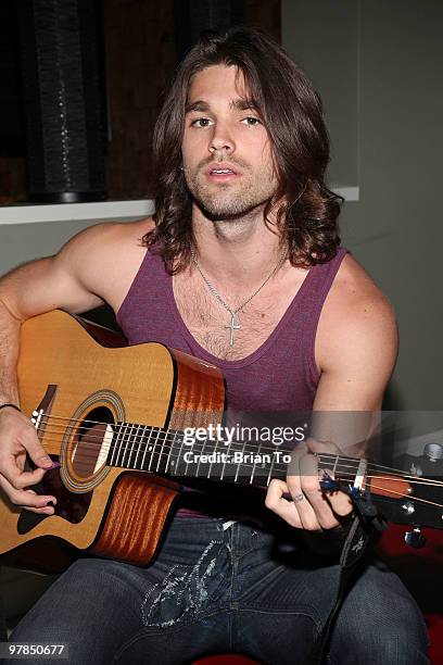 Justin Gaston poses for a photo at the "If I Can Dream" house on March 18, 2010 in Los Angeles, California.