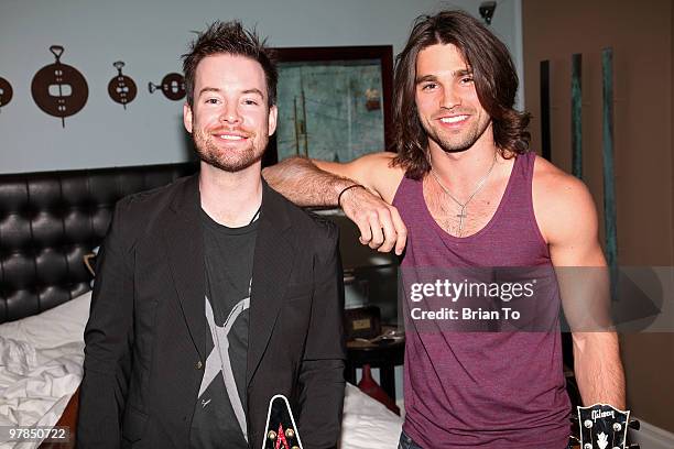 David Cook and Justin Gaston pose for a photo at the "If I Can Dream" house on March 18, 2010 in Los Angeles, California.