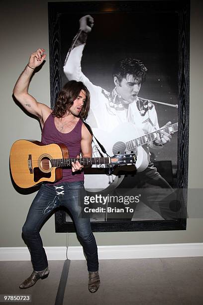 Justin Gaston poses for a photo at the "If I Can Dream" house on March 18, 2010 in Los Angeles, California.