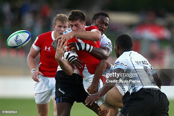 Pio Tuwai of Fiji tackles Justin Tipuric of Wales during the match between Wales and Fiji during day one of the IRB Adelaide International Rugby...