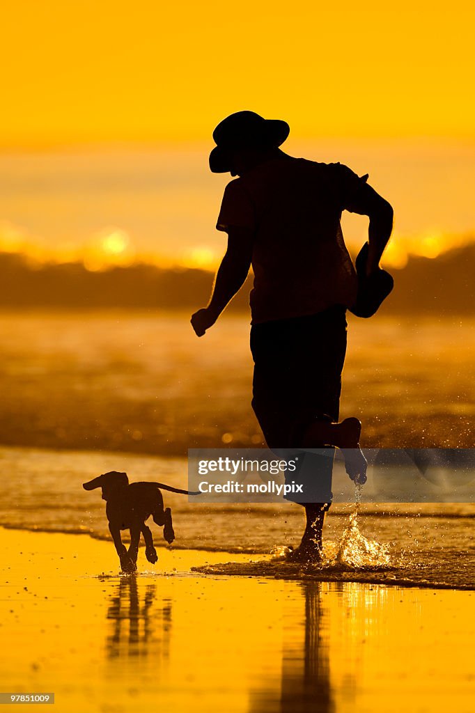 Man jogging with his dog