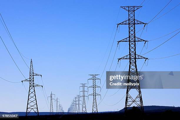 electricity transmission lines - mollypix stock pictures, royalty-free photos & images
