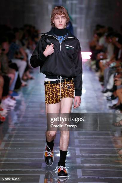 Model walks the runway at the Prada show during Milan Men's Fashion Week Spring/Summer 2019 on June 17, 2018 in Milan, Italy.