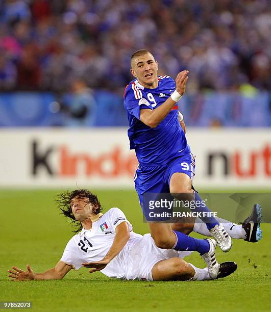French forward Karim Benzema is tackled by Italian midfielder Andrea Pirlo during the Euro 2008 Championships Group C football match France vs. Italy...