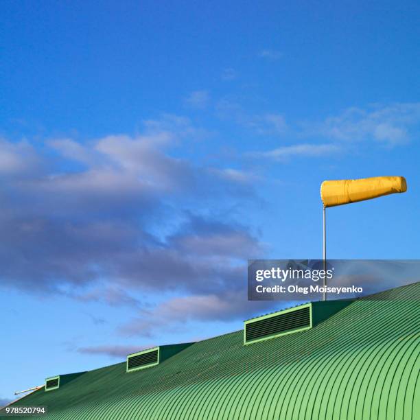 flying windsock - windsock stock pictures, royalty-free photos & images