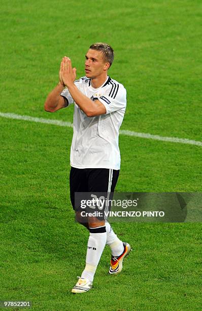 German forward Lukas Podolski celebrates after scoring a second goal during the Euro 2008 Championships Group B football match Germany vs. Poland on...