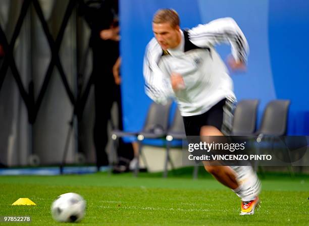 German forward Lukas Podolski sprints during a training session on June 11, 2008 in Klagenfurt. German will play their Euro 2008 Championships group...