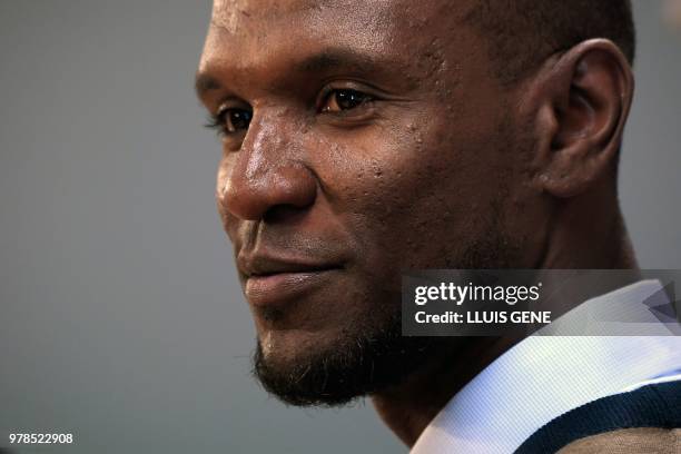 Barcelona's new technical secretary Eric Abidal looks on during his official presentation at the FC Barcelona Joan Gamper Sports Center in Sant Joan...