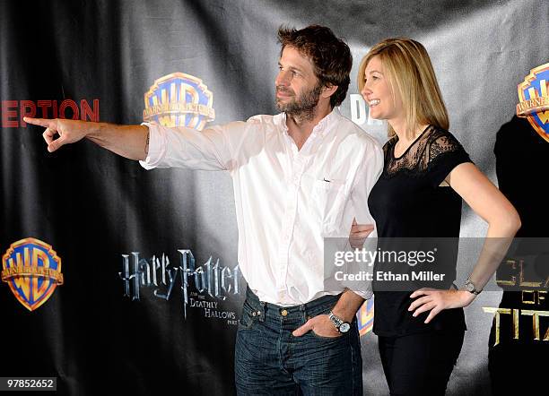 Director Zack Snyder and his wife, producer Deborah Snyder, arrive at the Warner Bros. Pictures presentation to promote their upcoming film, "Legend...