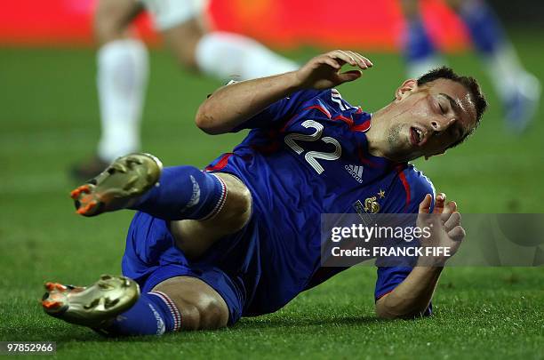 French midfielder Franck Ribery falls down during the Euro 2008 qualifying football match France vs. Scotland, 12 September 2007 at the...