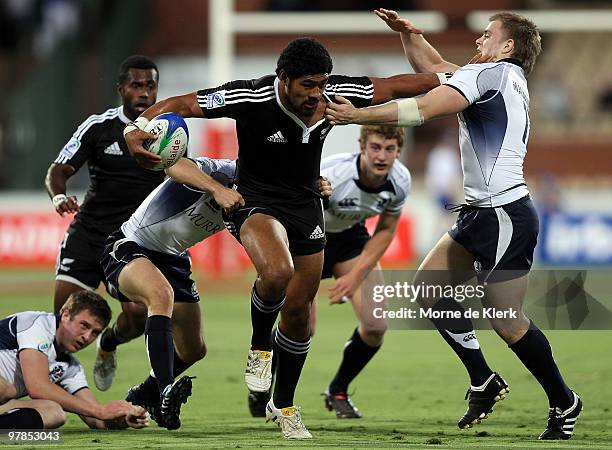 Fritz Lee of New Zealand is tackled during day one of the IRB Adelaide International Rugby Sevens match between New Zealand and Scotland at Adelaide...