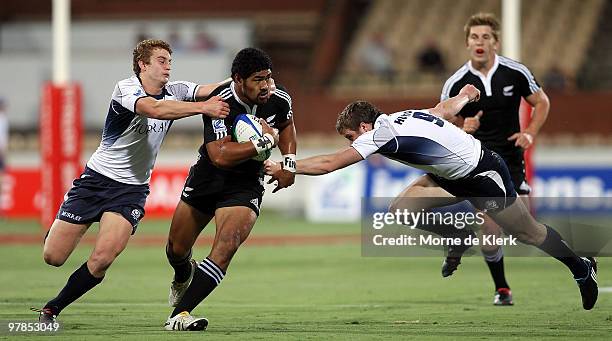 Fritz Lee of New Zealand is tackled during day one of the IRB Adelaide International Rugby Sevens match between New Zealand and Scotland at Adelaide...