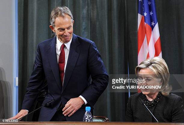 Former British premier Tony Blair, who is the special envoy for the Middle East Quartet, and US Secretary of State Hillary Clinton, take their seats...