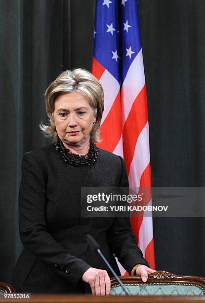 Secretary of State Hillary Clinton, takes her seat at a press conference after talks in Moscow on March 19, 2010. The International Quartet on the...