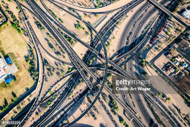 arizona freeway interchange from above - helicopter point of view stock pictures, royalty-free photos & images