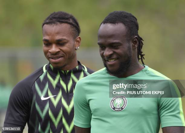 Nigeria's midfielder Joel Chukwuma Obi and forward Victor Moses attend a training session at Essentuki Arena, southern Russia, on June 19 during the...