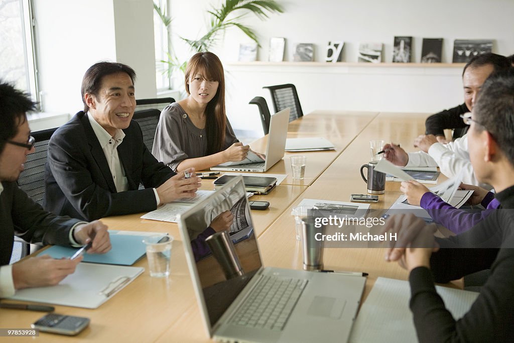 Businessmen who hold a meeting