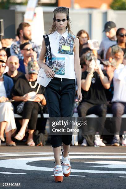 Model walks the runway at the Palm Angels show during Milan Men's Fashion Week Spring/Summer 2019 on June 17, 2018 in Milan, Italy.