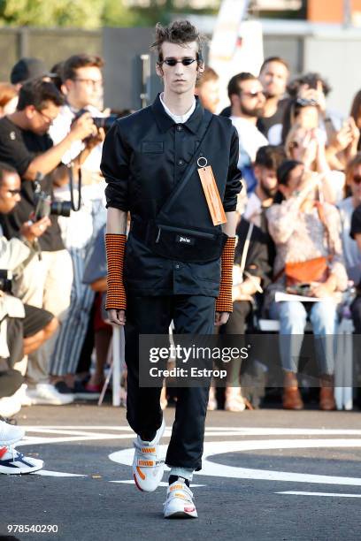 Model walks the runway at the Palm Angels show during Milan Men's Fashion Week Spring/Summer 2019 on June 17, 2018 in Milan, Italy.