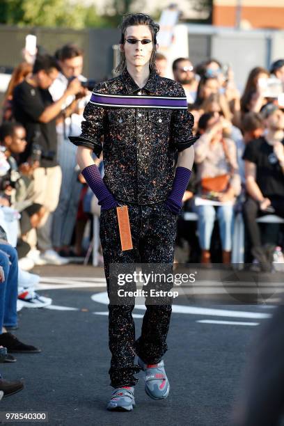 Model walks the runway at the Palm Angels show during Milan Men's Fashion Week Spring/Summer 2019 on June 17, 2018 in Milan, Italy.