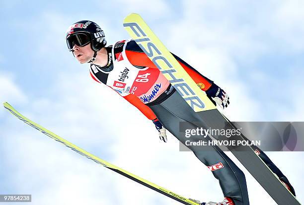 Anders Jacobsen of Norway soars through the air during the individual qualification of the Ski Jumping World Championship in Planica on March 18,...