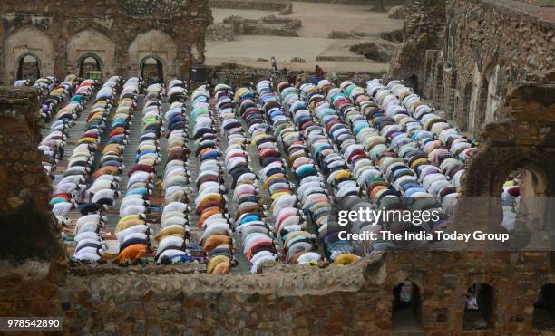 View of Muslims during Eid al-Fitr prayers at the Feroz Shah Kotla Mosque in New Delhi.