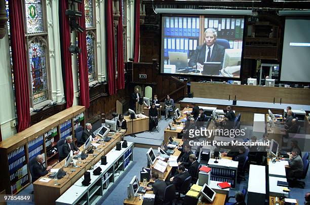 On the opening day of the inquiry Lord Saville can be seen on a giant video screen on March 27, 2000 in Derry, Northern Ireland. The Bloody Sunday...