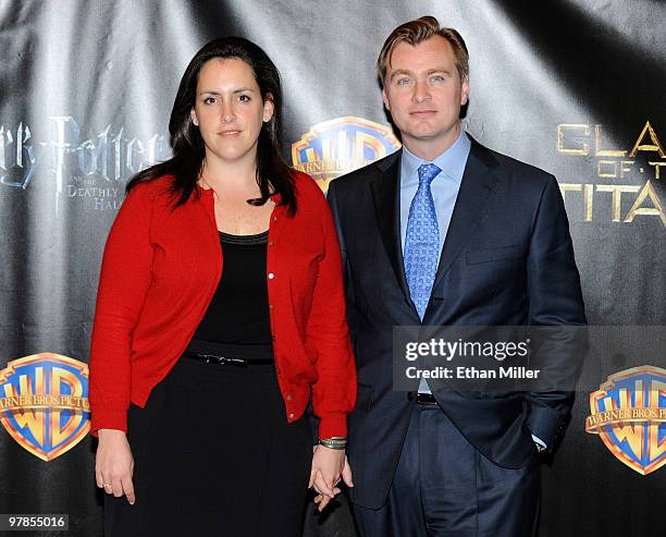 Producer Emma Thomas and her husband, director Christopher Nolan, arrive at the Warner Bros. Pictures presentation to promote their new film,...