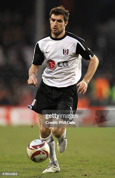 Aaron Hughes of Fulham in action during the UEFA Europa League Round of 16 second leg match between Fulham and Juventus at Craven Cottage on March...