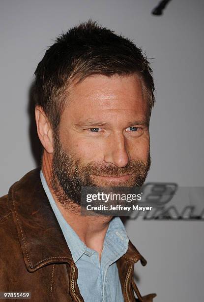 Actor Aaron Eckhart arrives at the Ferrari 458 Italia Brings Funds for Haiti Relief event at Fleur de Lys on March 18, 2010 in Los Angeles,...