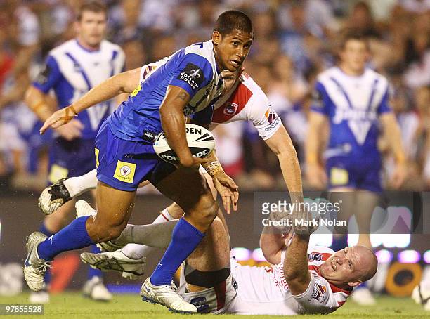 Ben Barba of the Bulldogs heads for the try line to score during the round two NRL match between the St George Illawarra Dragons and the Canterbury...