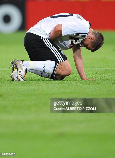 German forward Lukas Podolski falls during the Euro 2008 Championships Group B football match Germany vs. Poland on June 8, 2008 at Woerthersee...