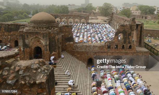 View of Muslims during Eid al-Fitr prayers at the Feroz Shah Kotla Mosque in New Delhi.